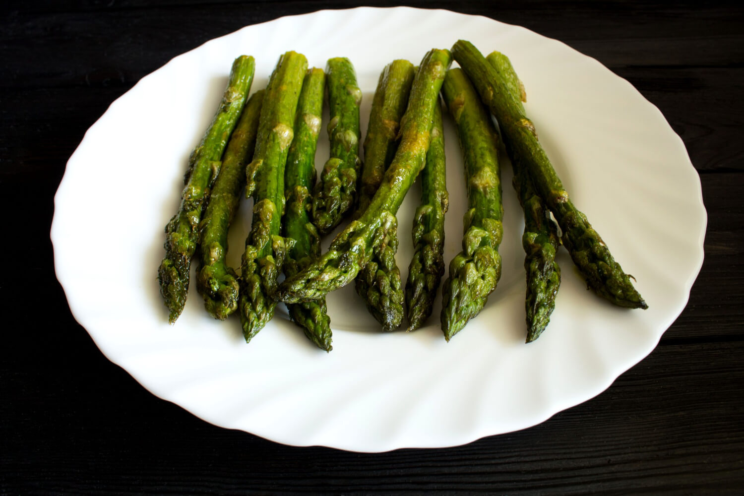 Crispy asparagus in air fryer, golden brown and perfectly roasted.