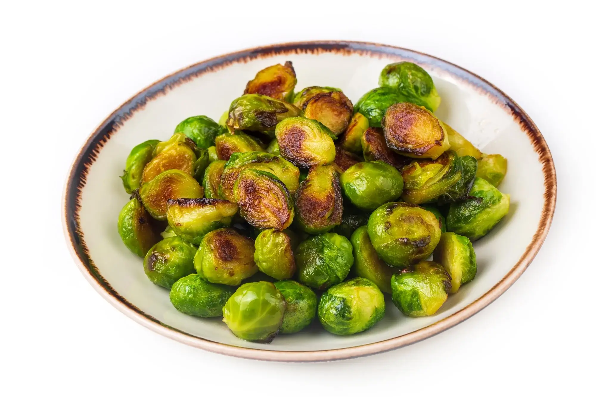 Crispy Brussels sprouts in air fryer, golden brown and roasted.