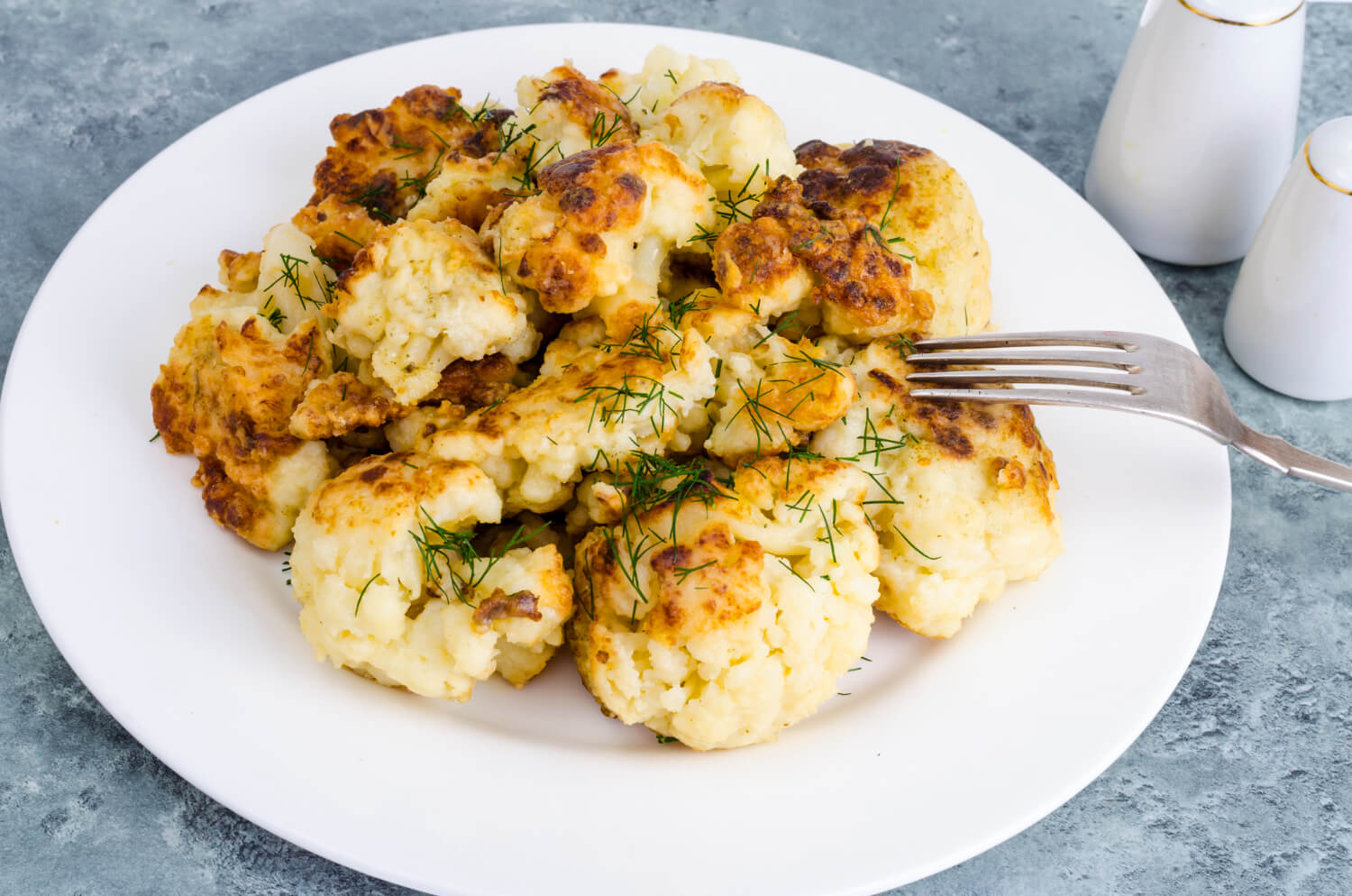 Crispy cauliflower in air fryer, golden brown and perfectly roasted.