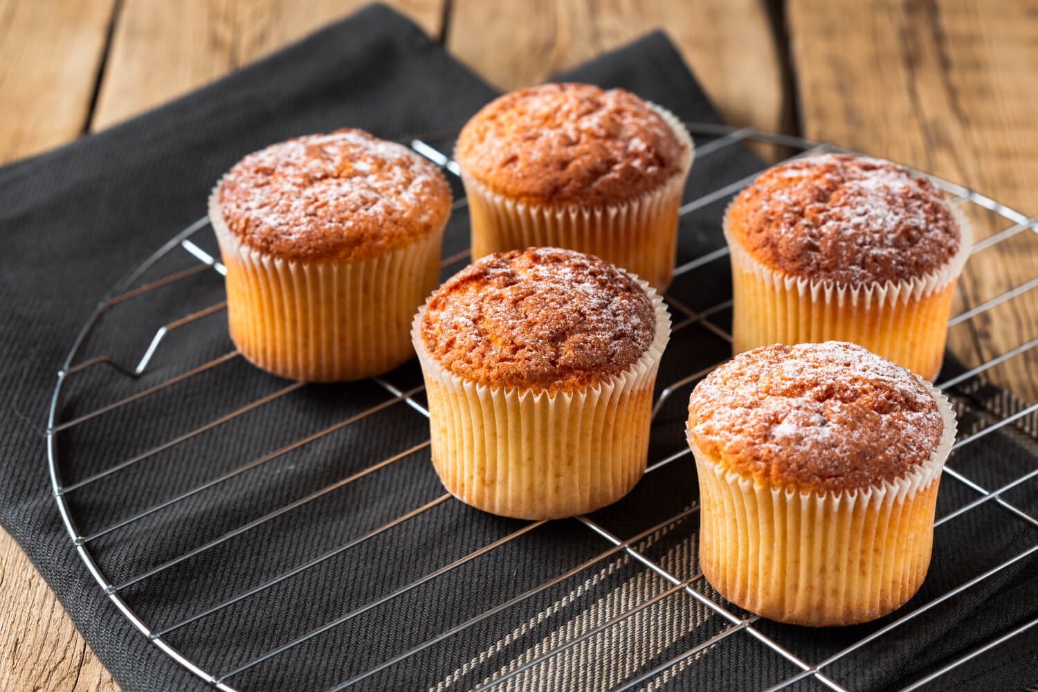 Fluffy cupcakes in air fryer, golden brown and perfectly baked.
