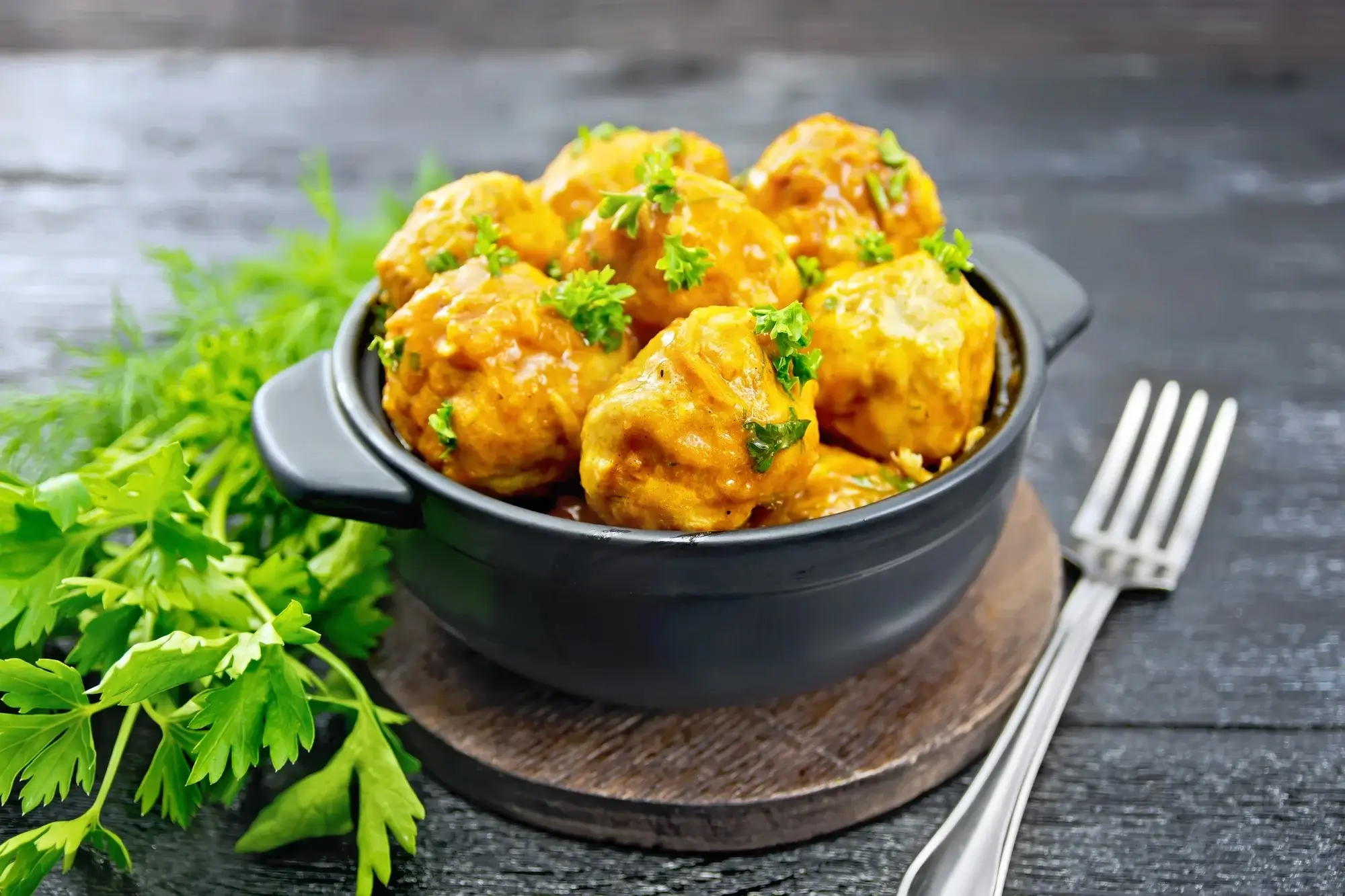 Juicy meatballs in air fryer, golden brown and perfectly cooked.